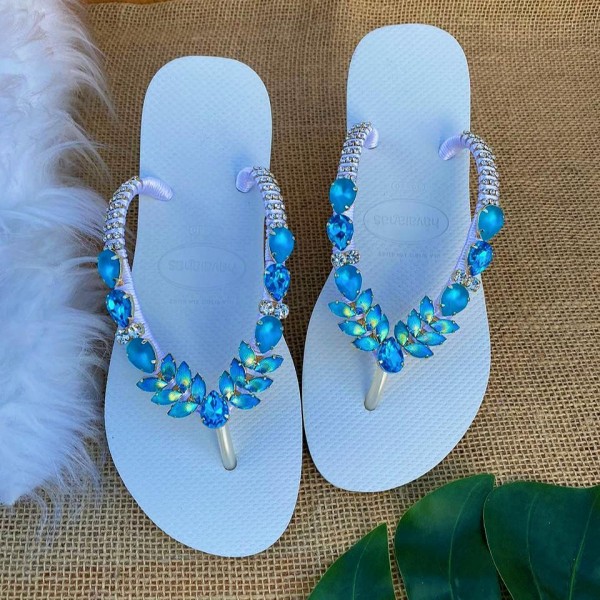 Light blue women slippers decorated with wonderful stones